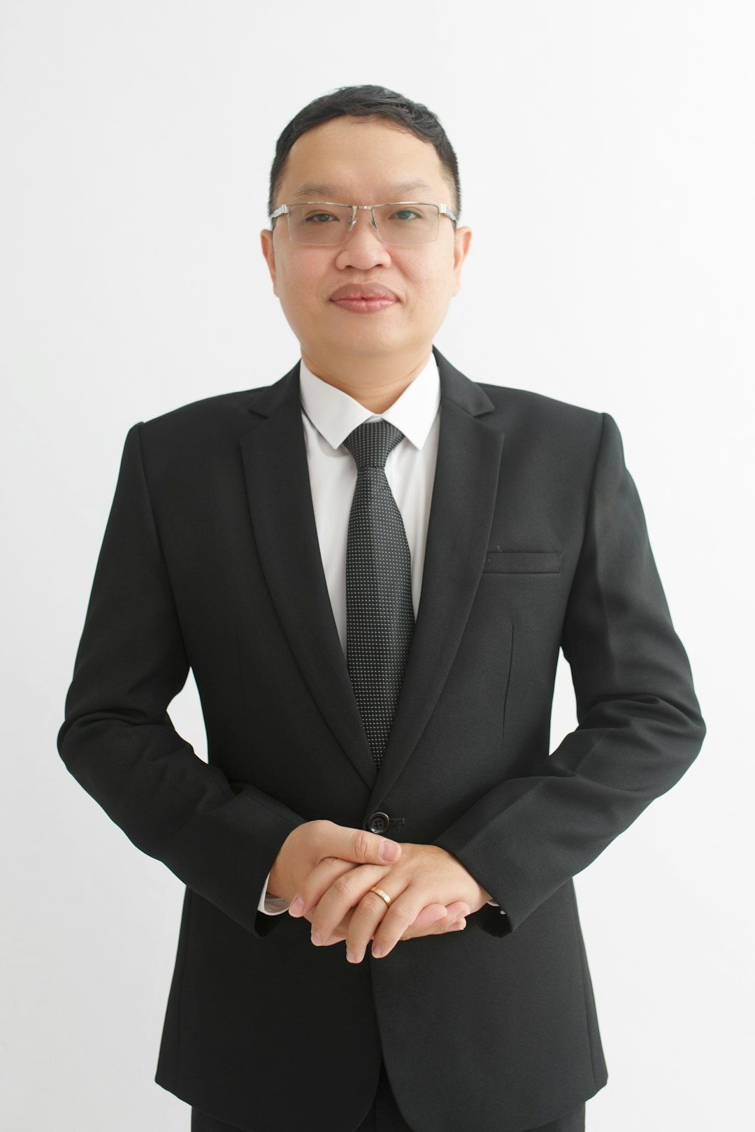 Portrait of a Belgian legal advisor smiling in an office setting